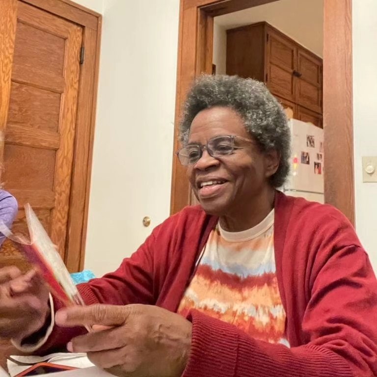 Mary Gill smiling in her studio